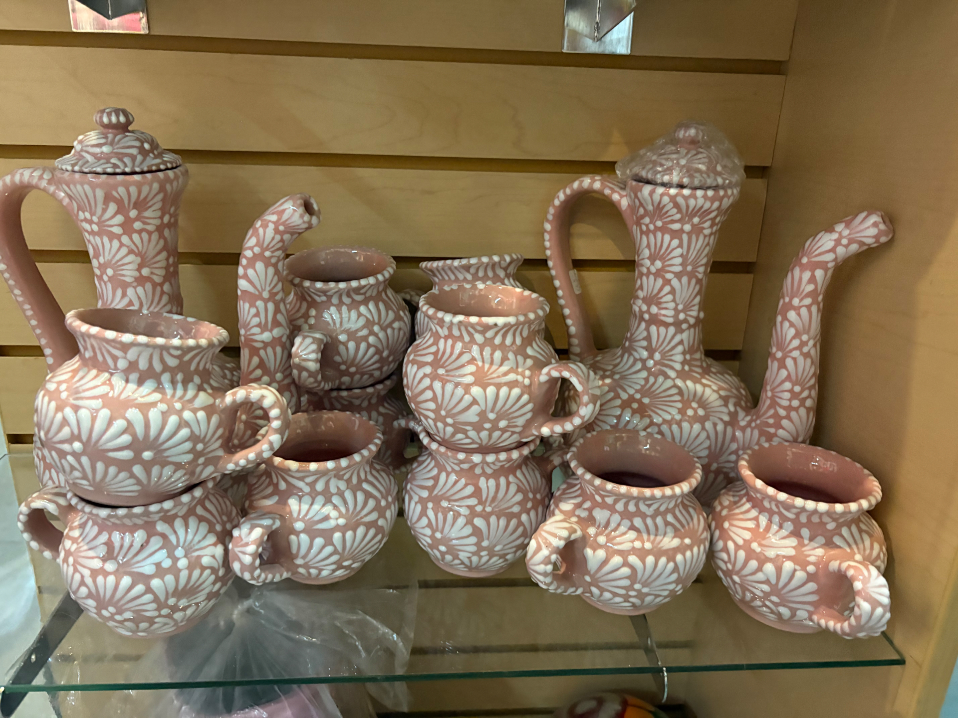 Soft pink hand-painted Mexican pottery pitchers and mugs